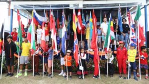 group of students at bisp on international day holding flags