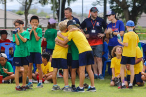 BISP cross country runners congratulating eachother