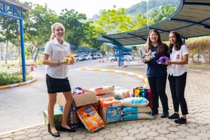 IB CAS students with goods to donate